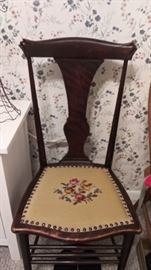 Antique chair with needlepoint seat
