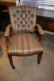 UPHOLSTERED ROLLING DESK CHAIR