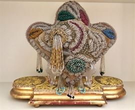 Indian antique beaded pillow. Stand sold separately.