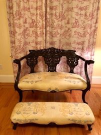 Antique French settee with foot bench. Newly upholstered.