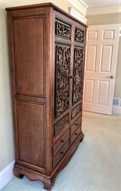 Antique Chinese front panels were used to create this stunning piece using the old techniques -- no hinges...