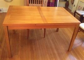 Danish teak dining table by Ansager Mobler - with pull-out leaves. As shown top is 35.5" x 53".