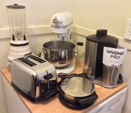 Kitchen appliances: vintage Waring blender, KitchenAid Professional 600 stand mixer, WaringPro juice extractor (Model JEX328), Chef's Choice waffle iron, Cuisinart toaster