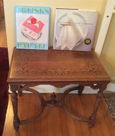 Vintage pyrography table (wood burning design on top), interesting cookbooks
