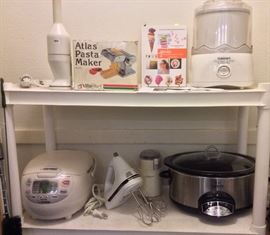 More appliances: Braun immersion blender, pasta maker, Cuisinart ice cream maker, Zojirushi Neuro Fuzzy rice cooker, KitchenAid hand mixer, coffee grinder, stainless CrockPot