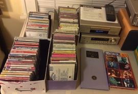 Lots of CDs (classical, swing, world music), Denon "Personal Component System" w/ AM-FM receiver (DRA-F100) & CD player (DCD-F100) + remote