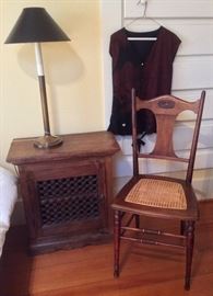 Rustic cabinet with iron grate on door, antique chair with cane seat, 1990s Onano vest (made from old kimono)