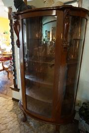 curved front curio cabinet