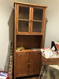 Pair of wall units with storage below/glass doors