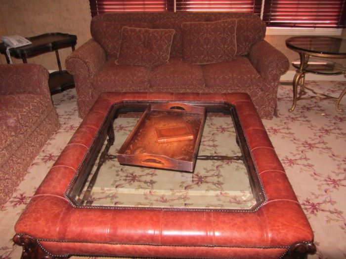 LEATHER TRIMMED GLASS TOP COFFEE TABLE