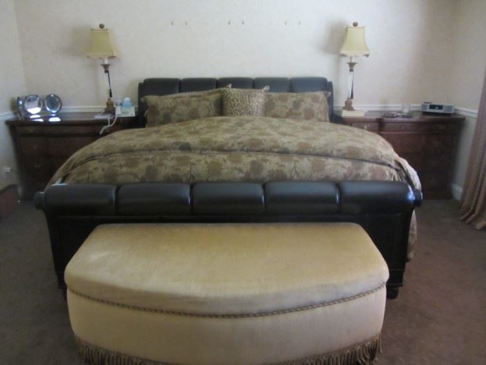 KING LEATHER BED AND FRINGED OTTOMAN