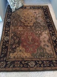 Wool carpet. Hand tufted. Made in India. 36"x54".