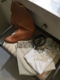 Many pieces of clothing are new with tags. 