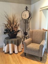 Contemporary clock by Howard Miller (sold), custom upholstered chair by Carter now just $125! and custom , large dried floral arrangement, only $200! (Floral originally cost $1000 - it's large!) . Round, custom table is now just $50! 