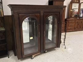 This is the top 1/2 of a beautiful china cabinet - the bottom portion is behind the glass part.
