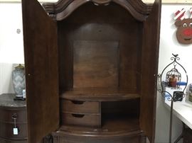 Armoire - open; gas cutout for TV or you can hang your clothes; drawers and open space above pull out drawers