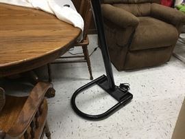 Bottom portion of black metal lamp