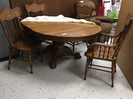 Oak claw foot table with 4 chairs