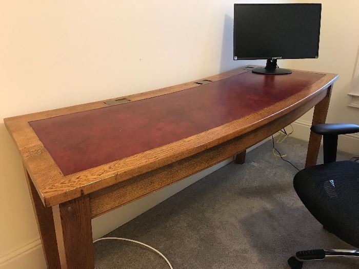 We have two of these hand made curved leather top desks and they are incredible.