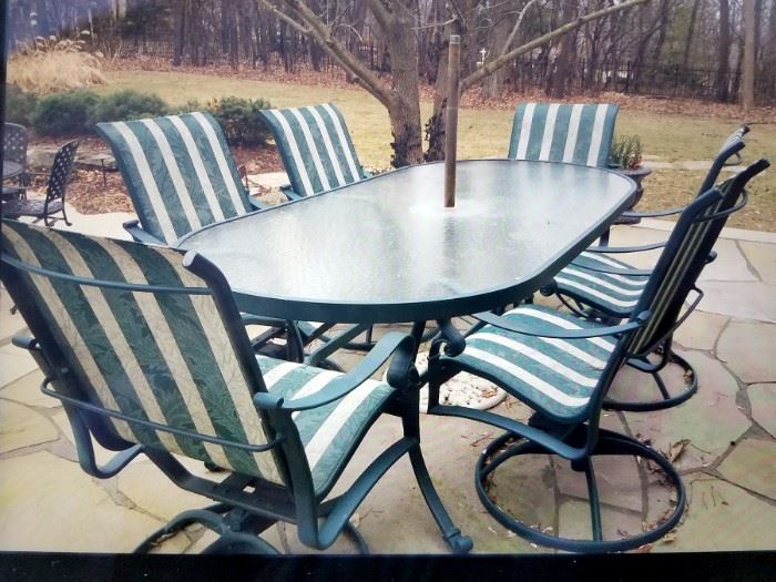 Winston patio table and six chairs (green umbrella not shown but comes with) $300