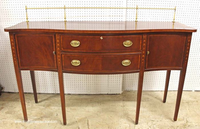 BEAUTIFUL Mahogany Banded and Inlaid 2 Door 2 Drawer Brandy Board with Brass Gallery and Bell Flower Inlay by “Ethan Allen Furniture”
Located Inside – Auction Estimate $700-$1200