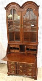 Mahogany Block Front Slant Front Desk with Bookcase Top by “Jasper Cabinet”
Located Inside – Auction Estimate $300-$600