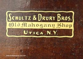 ANTIQUE Burl Mahogany Empire 2 Drawer Work Table by “Schultz & Drury Bros. Utica NY”
Located Inside – Auction Estimate $200-$400
