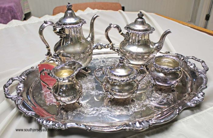5 Piece Gorham Sterling Tea Set with Silver Plate Serving Tray (6 Piece Total)
Weighs Approximately 81.3 ounces
Located Inside – Auction Estimate $1000-$2000