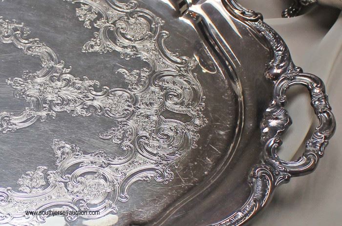 5 Piece Gorham Sterling Tea Set with Silver Plate Serving Tray (6 Piece Total)
Weighs Approximately 81.3 ounces
Located Inside – Auction Estimate $1000-$2000