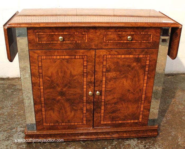 9 Piece Italian Style Burl Mahogany Lacquer Inlaid and Banded Dining Room Set – table has 2 leaves
Located Inside – Auction Estimate $500-$1000