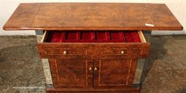 9 Piece Italian Style Burl Mahogany Lacquer Inlaid and Banded Dining Room Set – table has 2 leaves
Located Inside – Auction Estimate $500-$1000
