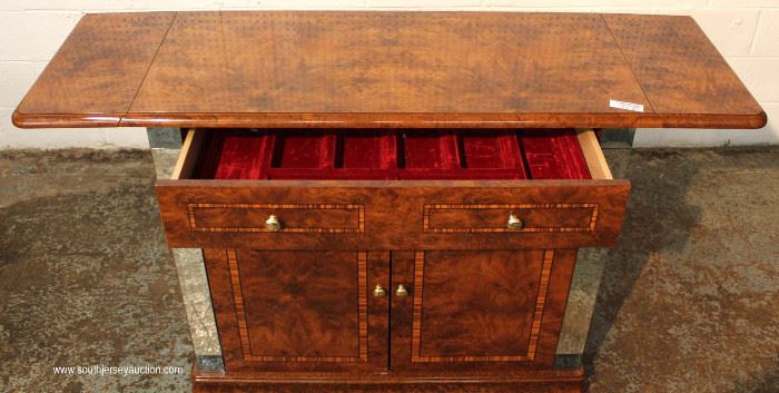 9 Piece Italian Style Burl Mahogany Lacquer Inlaid and Banded Dining Room Set – table has 2 leaves
Located Inside – Auction Estimate $500-$1000