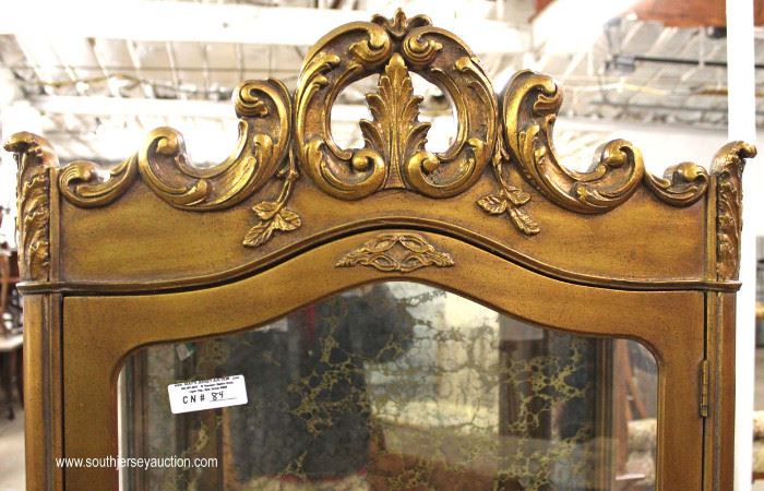 Italian Mirrored Back Carved Crystal Cabinet
Located Inside – Auction Estimate $100-$300