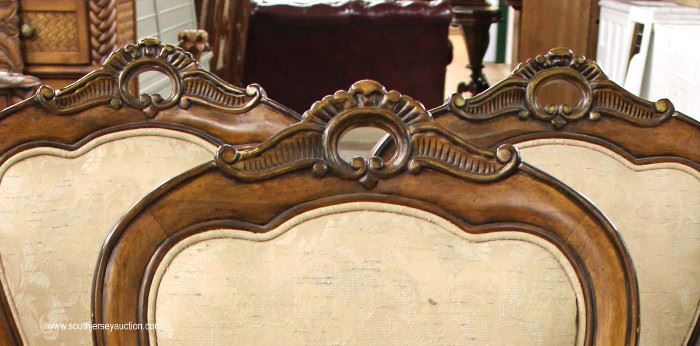 8 Piece Contemporary Carved and Banded Mahogany Dining Room Set – Table has 2 Leaves
Located Inside – Auction Estimate $400-$800