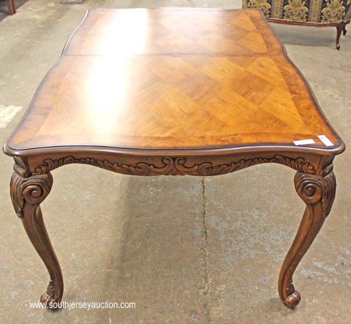8 Piece Contemporary Carved and Banded Mahogany Dining Room Set – Table has 2 Leaves
Located Inside – Auction Estimate $400-$800
