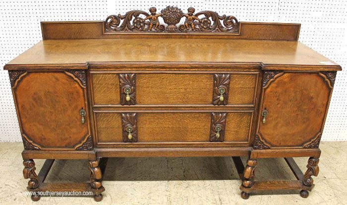 ANTIQUE Oak Buffet with Carved Cherub Back Splash
Located Inside – Auction Estimate $400-$800