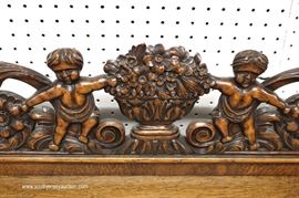 ANTIQUE Oak Buffet with Carved Cherub Back Splash
Located Inside – Auction Estimate $400-$800