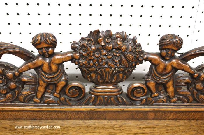 ANTIQUE Oak Buffet with Carved Cherub Back Splash
Located Inside – Auction Estimate $400-$800