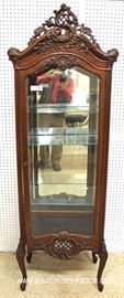 Early 20th Century Highly Carved Mirrored Back French Style Display Cabinet – Nice Size
Located Inside – Auction Estimate $300-$600