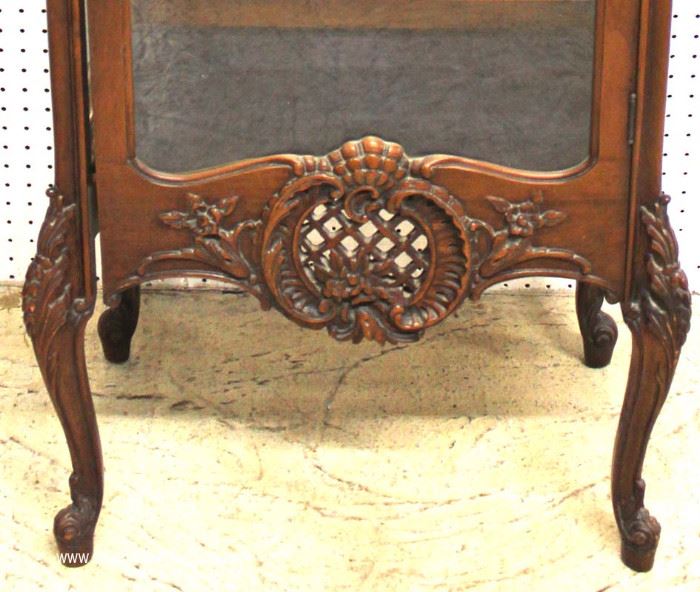 Early 20th Century Highly Carved Mirrored Back French Style Display Cabinet – Nice Size
Located Inside – Auction Estimate $300-$600