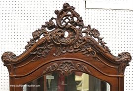 Early 20th Century Highly Carved Mirrored Back French Style Display Cabinet – Nice Size
Located Inside – Auction Estimate $300-$600