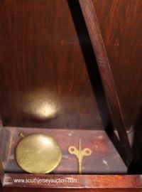 Mahogany Tall Case Grandfather Clock with Weights and Pendulum
Located Inside – Auction Estimate $100-$300