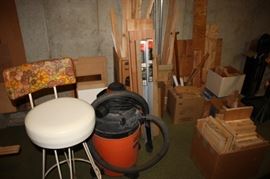 Wood pieces/shop vac/ workshop chair