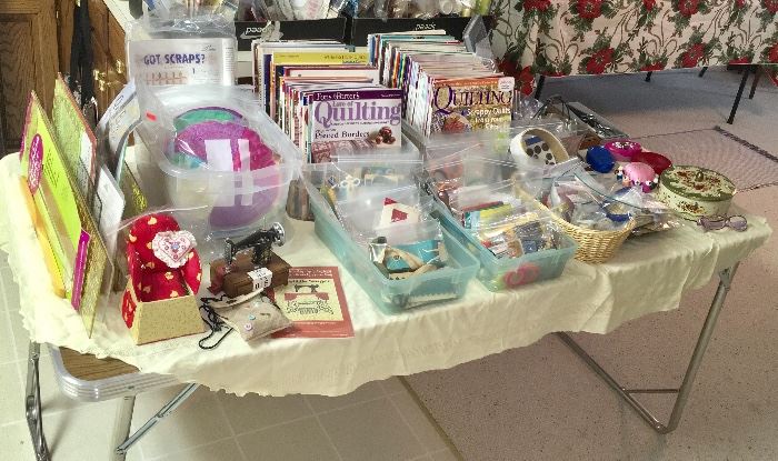 LARGE GROUPING OF SEWING AND QUILTING BOOKS AND SUCH.