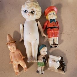old Frozen charlottes and porcelain dolls