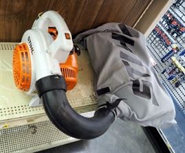Stihl SH56C-E Hand Held Shredder Vac/Blower, Gas Powered, Includes Collection Bag, Nozzles, Owners Manual, New
