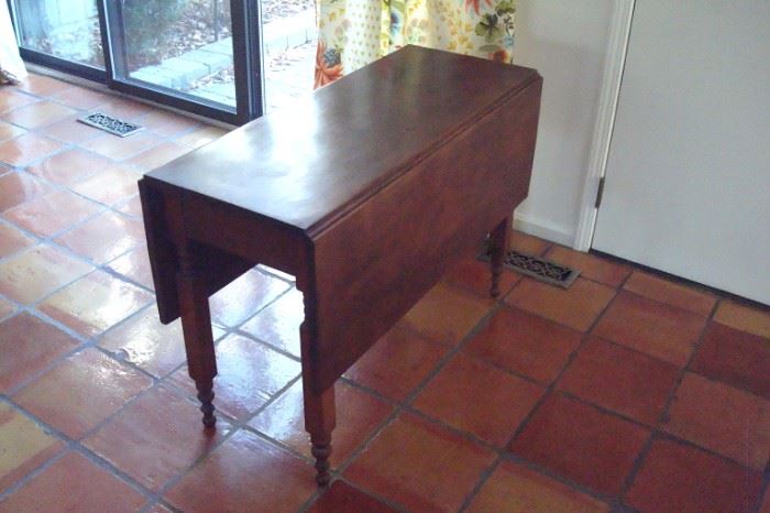 Antique cherry drop leaf table, C-1850.