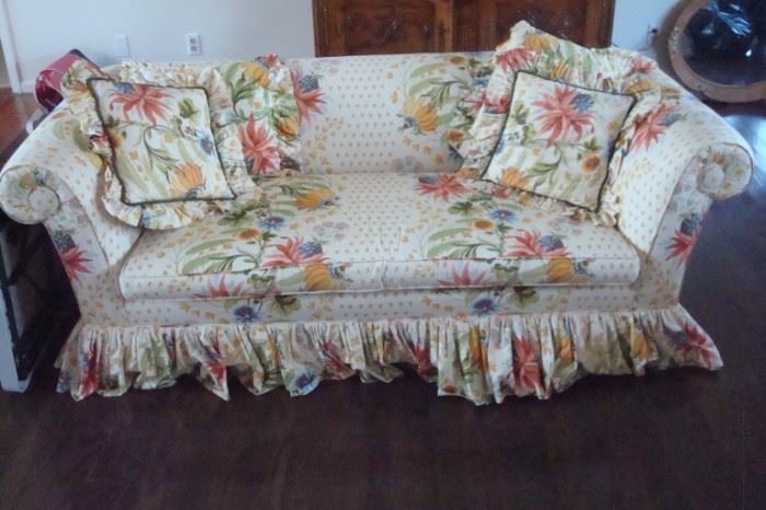 Custom upholstered love seat.