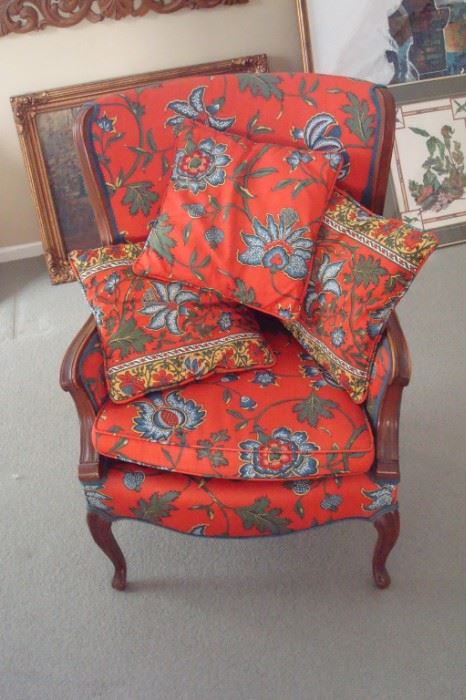 Custom upholstered wing back Queen Anne chair.