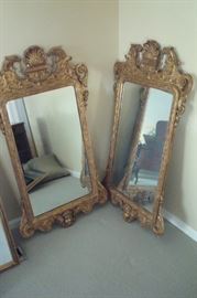 Fabulous, rare, Italian giltwood antique mirrors with Cupids and eagles carvings.